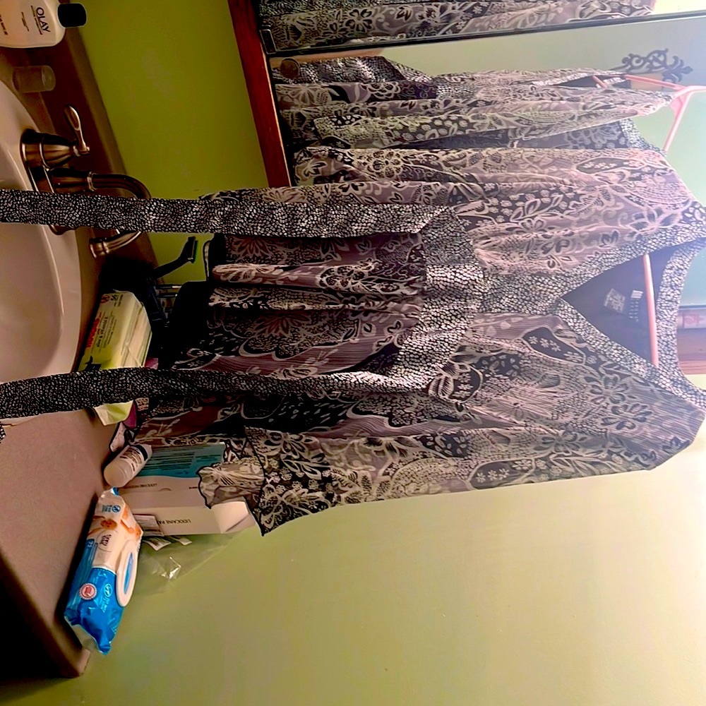 Gorgeous shimmering silk with ties and black sheer material underneath